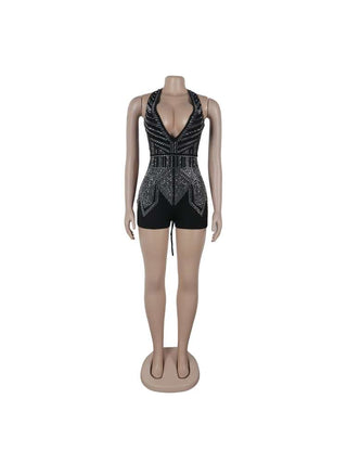 Mono con espalda descubierta, encaje y cuello halter adornado
