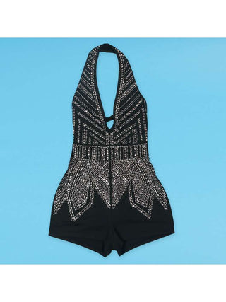 Mono con espalda descubierta, encaje y cuello halter adornado